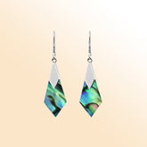 Sterling silver Abalone shell drop earrings in a modern geometric design, featuring shimmering blue-green iridescence and handcrafted artisan silver.